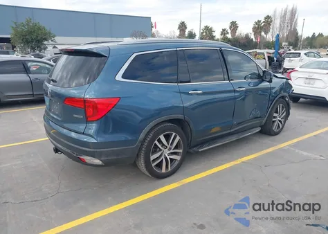 2017 Honda Pilot Touring z USA, uszkodzony, nr VIN 5FNYF5H93HB001903